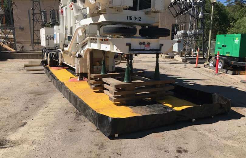 Husky Heavy Duty Aluminum Patriot Secondary Containment Berm with heavy equipment