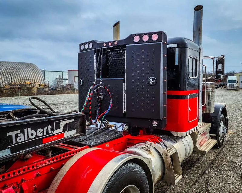 Iconic Angled Vader Stainless Steel Headache Rack on red truck