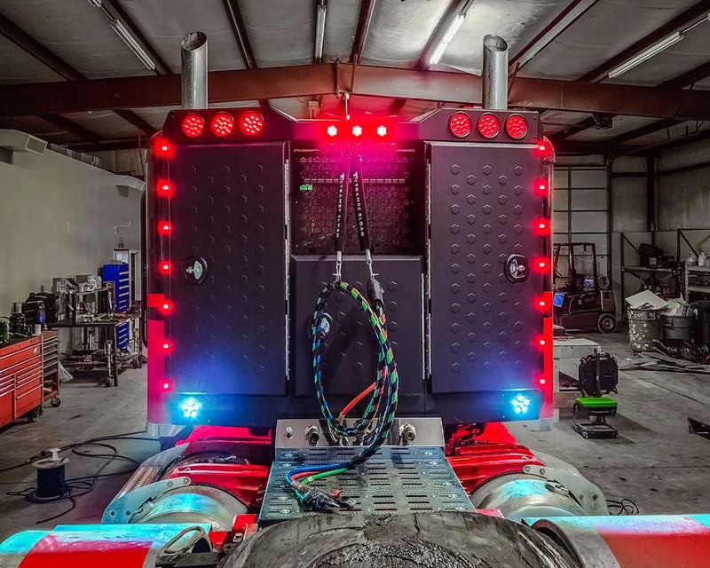 Iconic Angled Vader Stainless Steel Headache Rack on red truck center