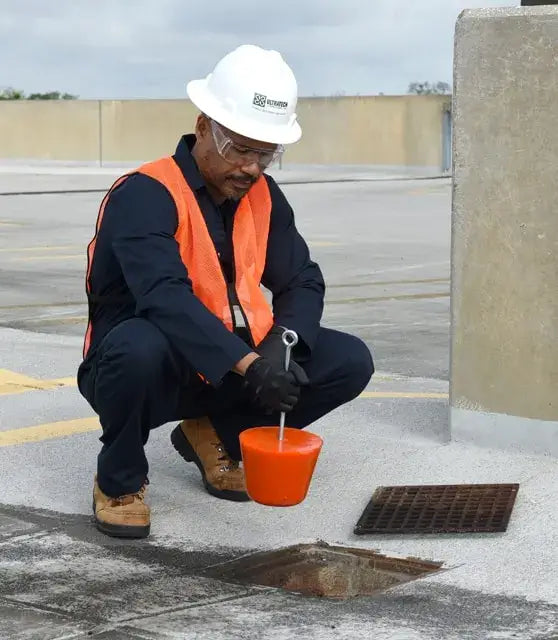 Ultra Drain Plug held by worker