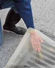 Ultra Drain Seal Clear Model closeup of hand under liner