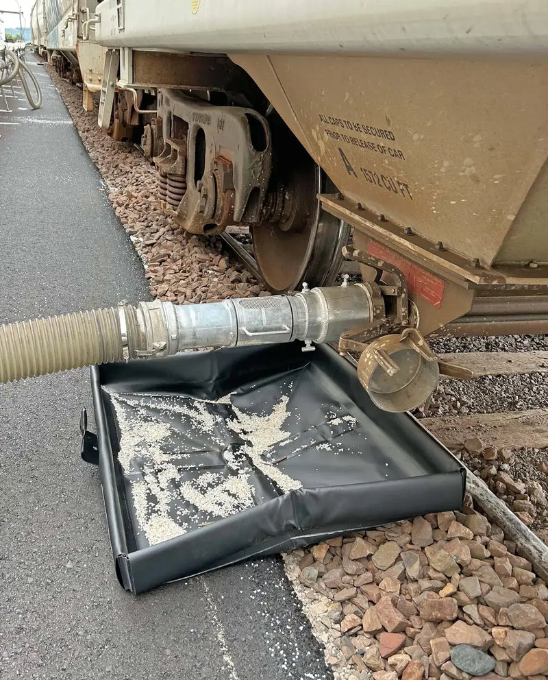 Ultratech Pellet Pond hose connected to railcar