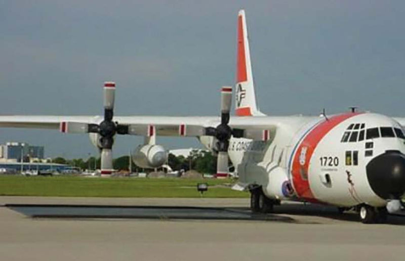 Husky Eagle Washdown Containment Mat next to aircraft