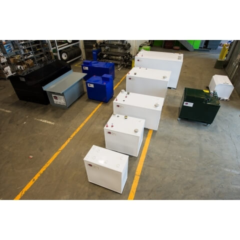 Midwest Industrial Fuel Storage Tanks lined up by size